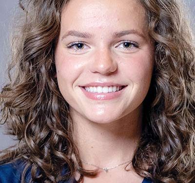 ‘She’s very determined’:  Farmington alumnae posts impressive college swimming debut