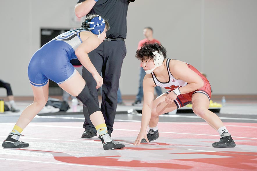 Off to a great start: Miyamura grad moves up a weight class and finds success