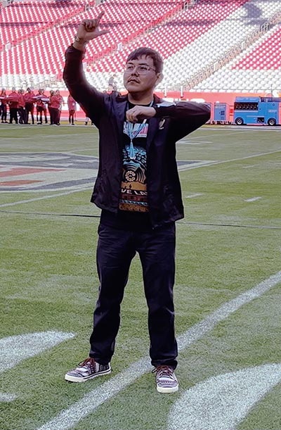 Diné deaf scholar performs at Super Bowl LVII pre-game show