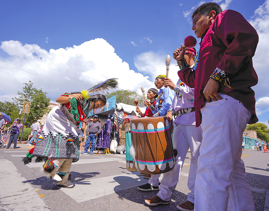 Young people from Jemez Pueblo maintain tradition through dance and song at the Santa Fe Indian Market