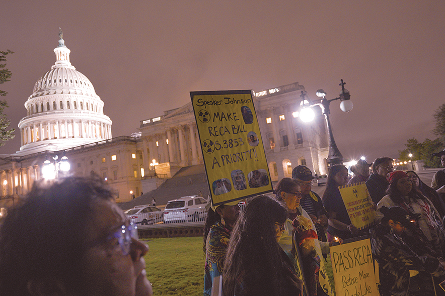 Candlelight vigil honors victims of uranium mining and atomic testing