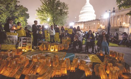 Candlelight vigil honors victims of uranium mining and atomic testing