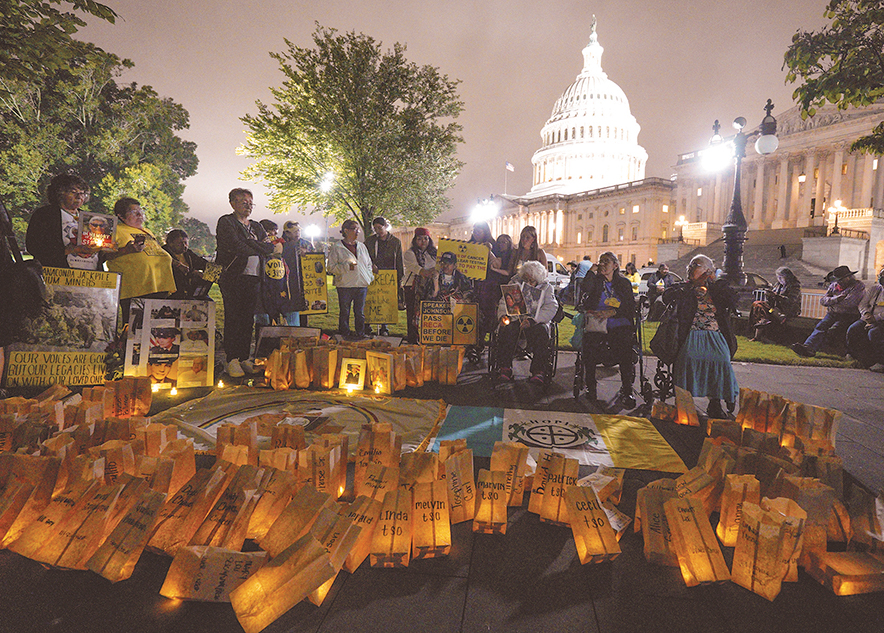 Candlelight vigil honors victims of uranium mining and atomic testing