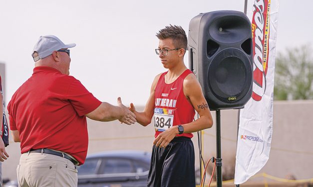 Valley Lutheran’s Benjamin Benally wins Division IV state crown