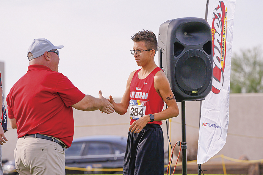 Valley Lutheran’s Benjamin Benally wins Division IV state crown