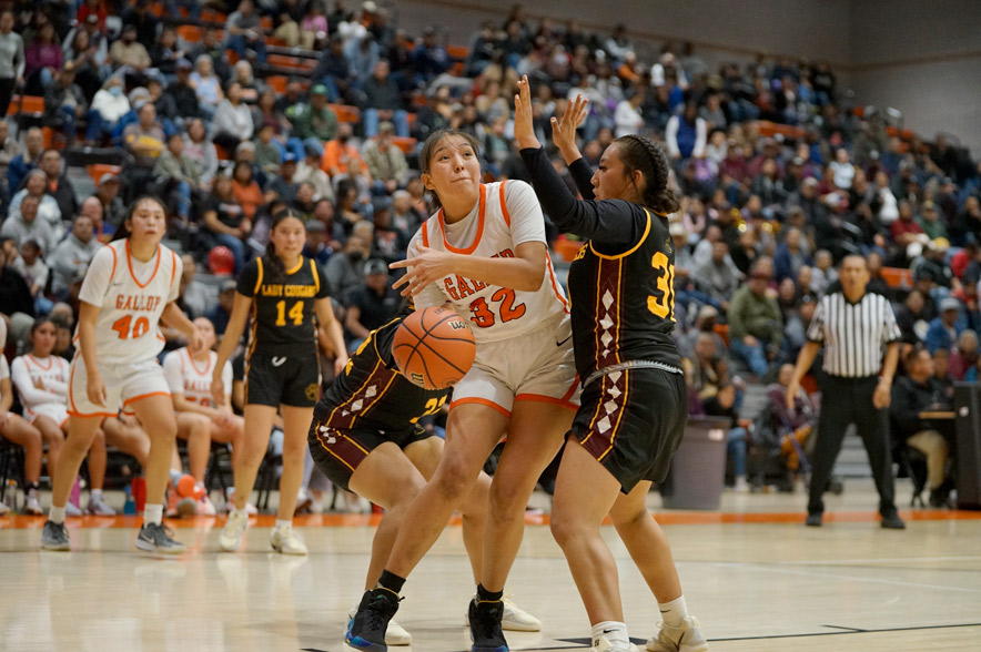 Defensive effort sends Gallup girls into home tournament championship game