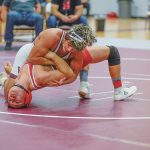 AIA state wrestling: 6 area grapplers one match away from title bout