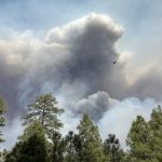 Smoke rises over St. Michaels as Oak Ridge Fire spreads