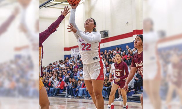 Holbrook holds off late Winslow rally in 50-42 win