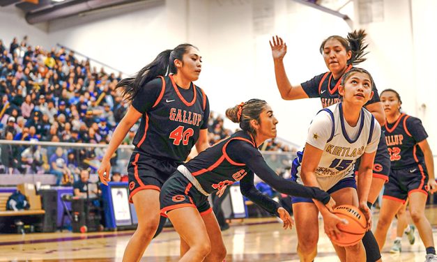 Top-ranked KC girls roll past No. 2 Gallup