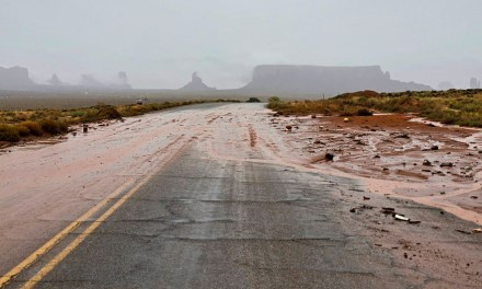Flooding damages roads as power, water outages persist